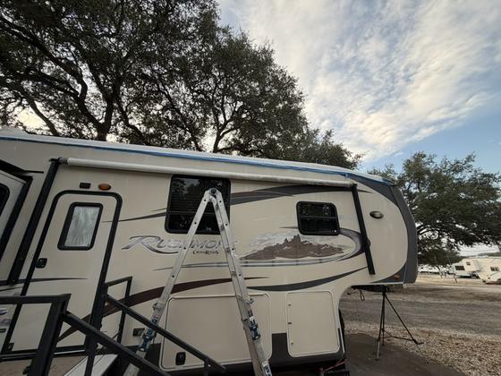 A CrossRoads Rushmore fifth wheel in Boerne, Texas after a CrazySeal roof system was installed